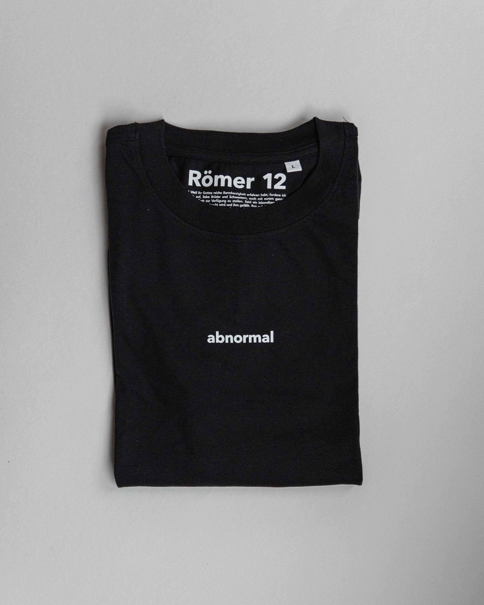 Moderner schwarzer T-Shirt mit "abnormal" Print, christliche Mode, christliches Design, mit Logo.