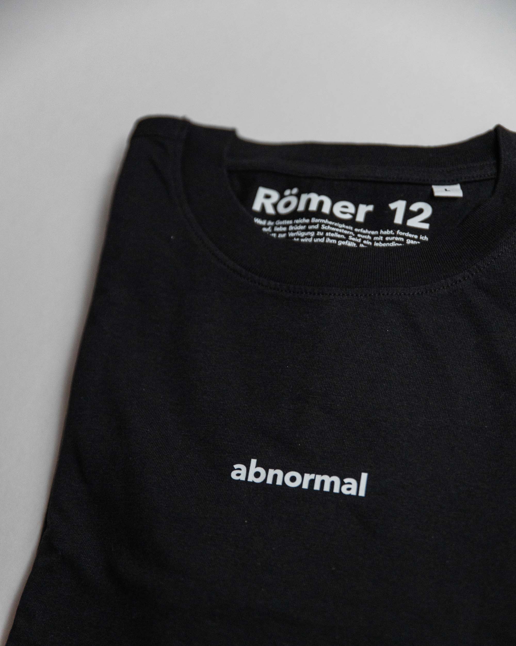 abnormal / tshirt / römer12 12 Moderner schwarzer Christentext-Shirt mit "abnormal" Design, christliche Marken, Glaube Mode.