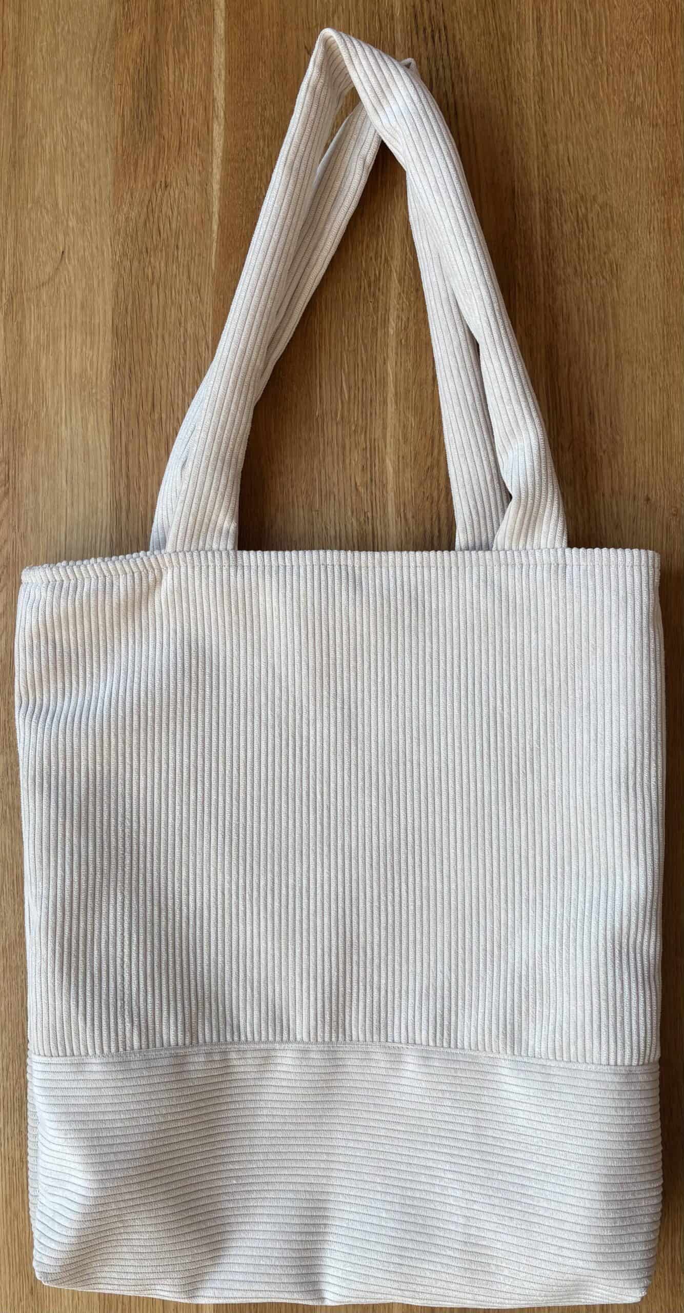 Cord Tasche 2 Elegante weiße Baumwolltasche mit Cord-Optik für christliche Marken, umweltfreundlich und langlebig.